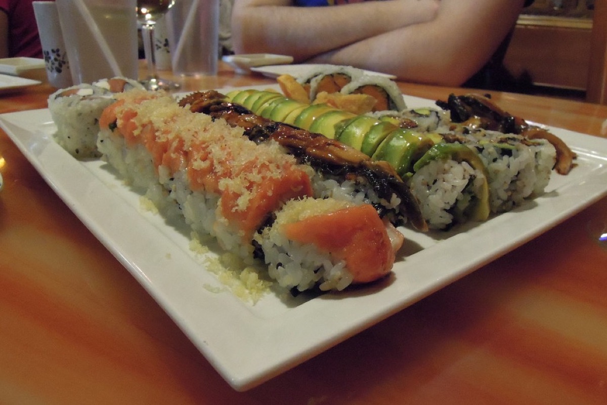 Before: the sushi platter as a dim, blurry phone photo